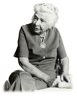 Portrait of an Old Woman Teaching in Black and White