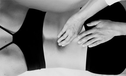 A Woman Getting a Back Rub in Black and White